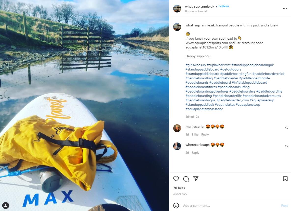 picture of an aquaplanet paddle board on a lake posted on Instagram 